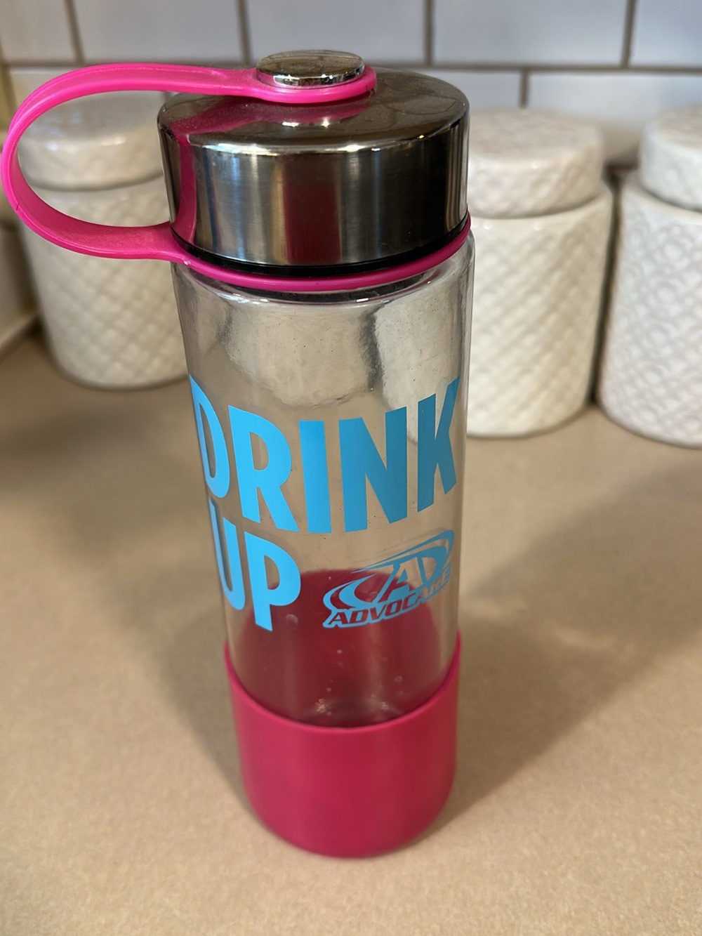 Advocare glass bottle